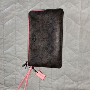 Coach 2 zipper clutch, brown with pink accent.